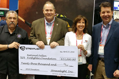 Caption: Streamlight, Inc. presents the company’s 2018 donation check to the National Fallen Firefighters Foundation (NFFF) for programs assisting families and surviving colleagues of fallen firefighters. Pictured from left to right: Chief Ronald J. Siarnicki, Executive Director, NFFF; Chief Dennis Compton, Chairman of the Board of Directors, NFFF; Dawn Dalldorf-Jackson, Director of Sales, Industrial and Fire Divisions, Streamlight; and Michael F. Dineen, Vice President, Sales and Marketing, Streamlight.