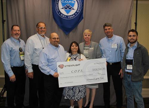 COPS National President, Cheryl Schultz, and Executive Director, Dianne Bernhard, at National Police Week 2018 with Streamlight representatives.